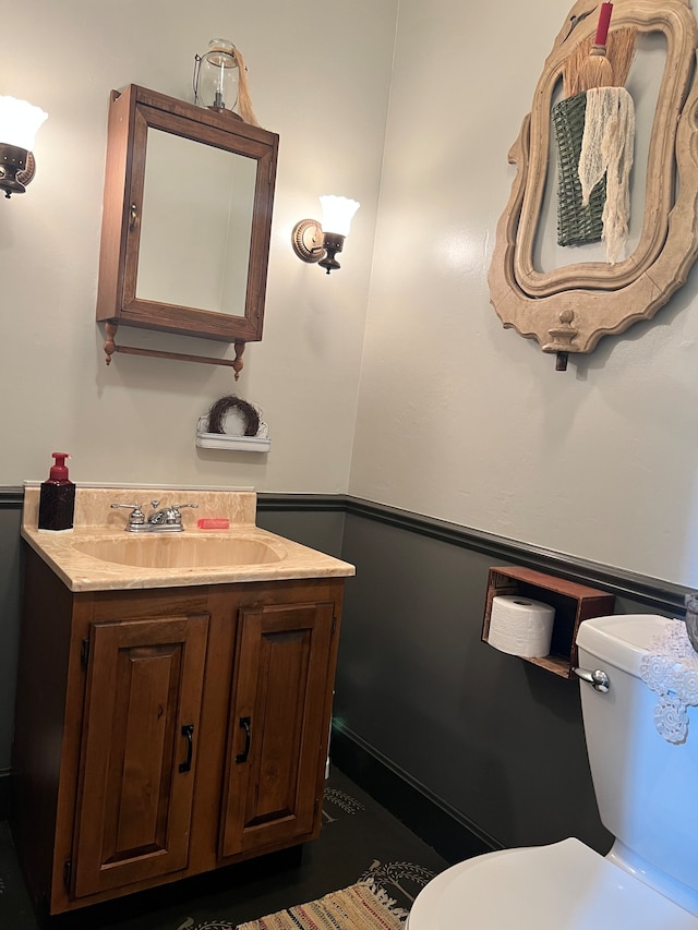 bathroom with oversized vanity and toilet