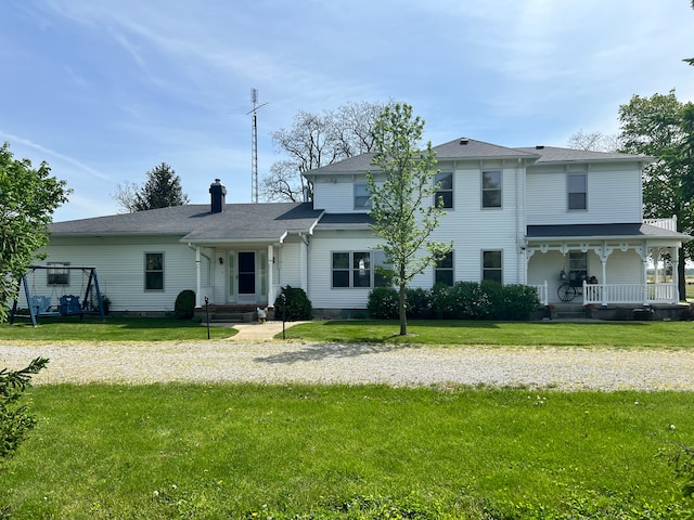 view of front of property with a front lawn