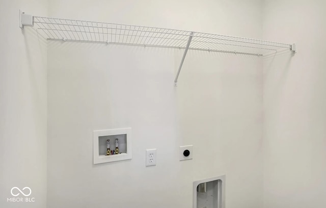 washroom featuring washer hookup and electric dryer hookup