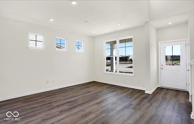 interior space featuring dark hardwood / wood-style floors and plenty of natural light