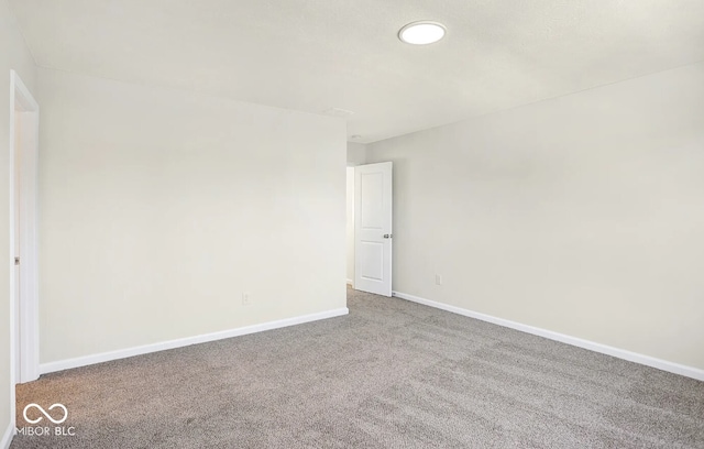 unfurnished room with carpet