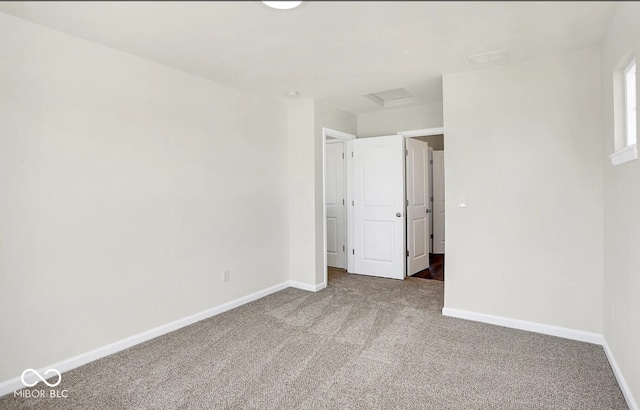 unfurnished bedroom featuring carpet