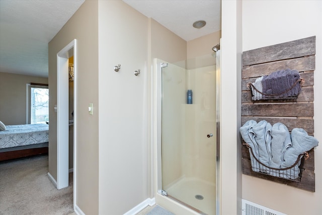 bathroom with an enclosed shower