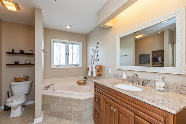 bathroom featuring tile flooring, toilet, tiled tub, and large vanity