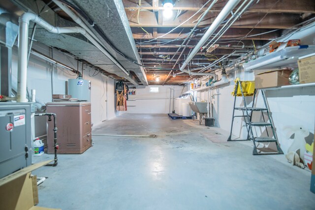 2925 Highwoods Dr, Indianapolis, IN 46222 - basement with water heater