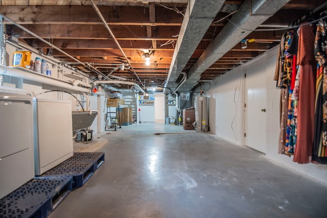 2925 Highwoods Dr, Indianapolis, IN 46222 - unfinished below grade area featuring heating unit, a sink, and water heater