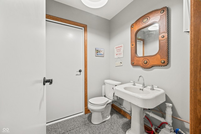 bathroom featuring toilet