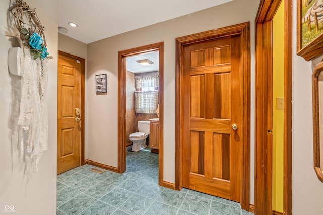 corridor with tile floors