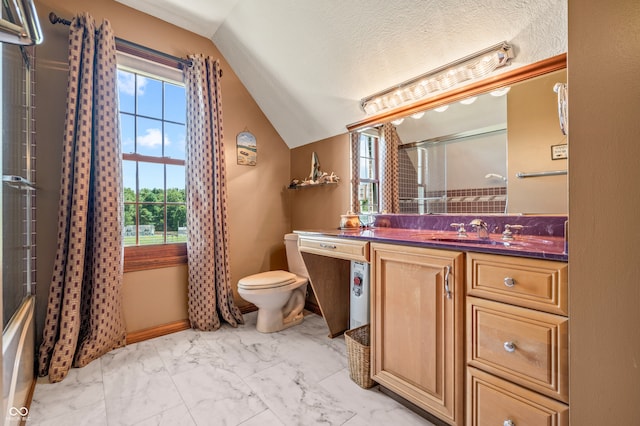 full bathroom with a textured ceiling, lofted ceiling, tile floors, vanity, and toilet