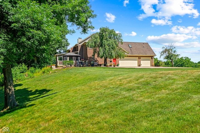 view of yard featuring a garage