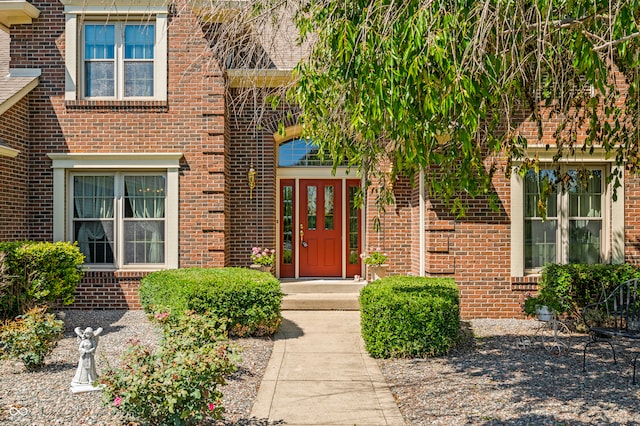 property entrance featuring french doors