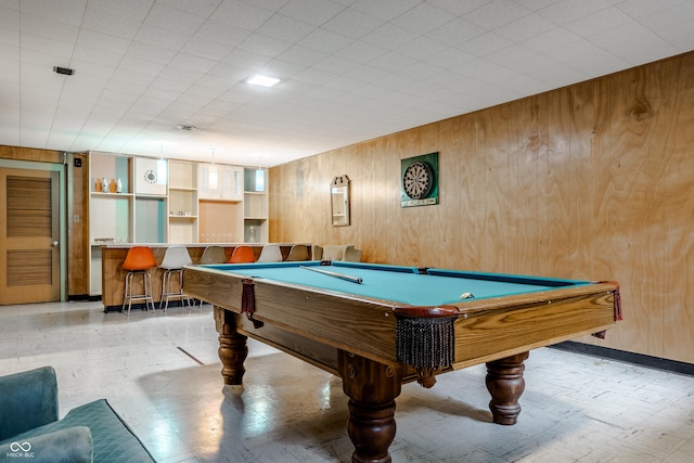 recreation room featuring wood walls and pool table