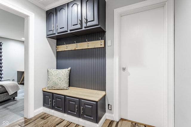 mudroom with ornamental molding