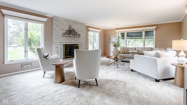 living room featuring a large fireplace, light colored carpet, and crown molding