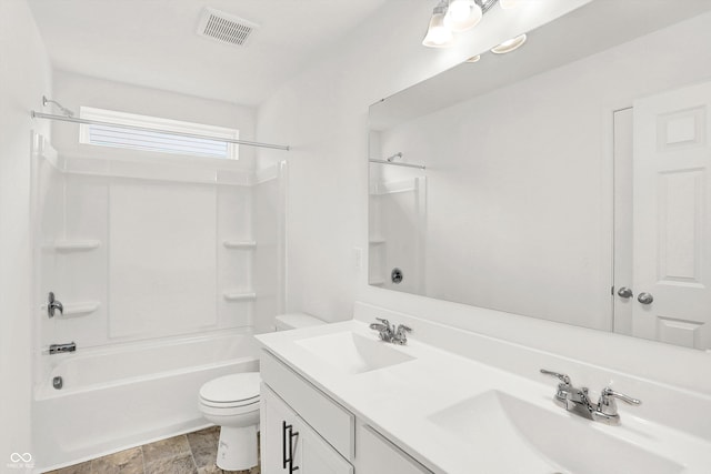 full bathroom featuring shower / bathtub combination, toilet, and vanity