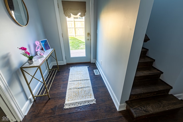 entryway with dark hardwood / wood-style floors