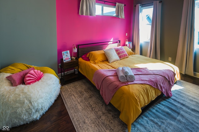 bedroom featuring wood-type flooring