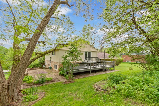 view of yard with a wooden deck