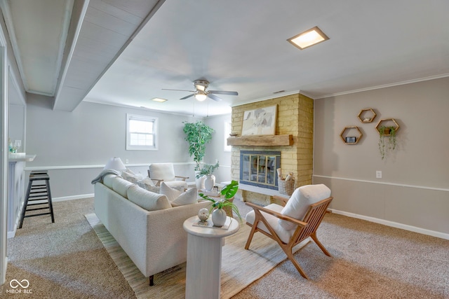 carpeted living room featuring ceiling fan, brick wall, and a brick fireplace