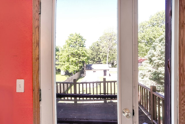 doorway to outside featuring plenty of natural light