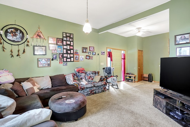 living room with light carpet and ceiling fan