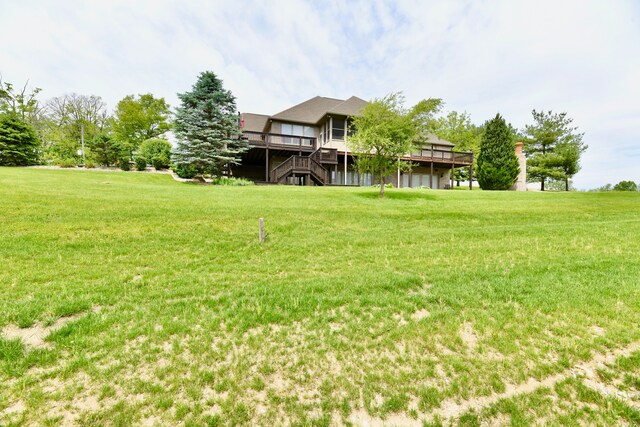 view of yard with a deck