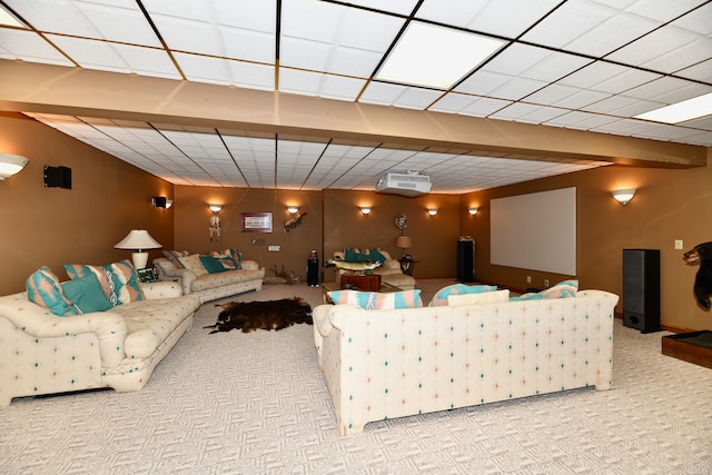 living room featuring a paneled ceiling and carpet floors