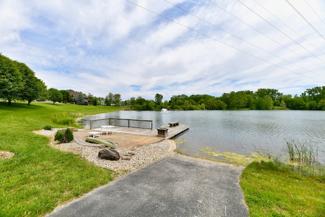 view of water feature with a dock