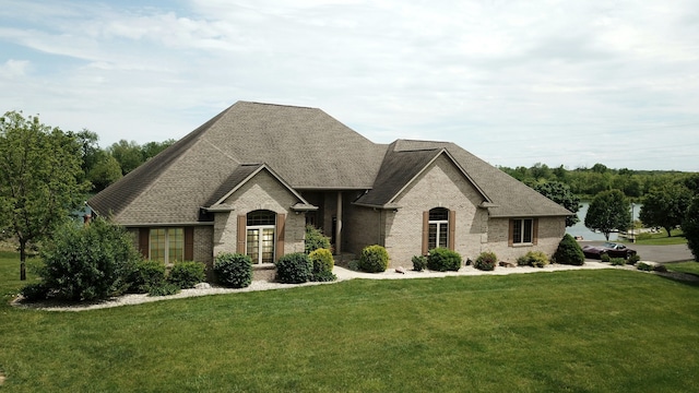 french country home with a front yard