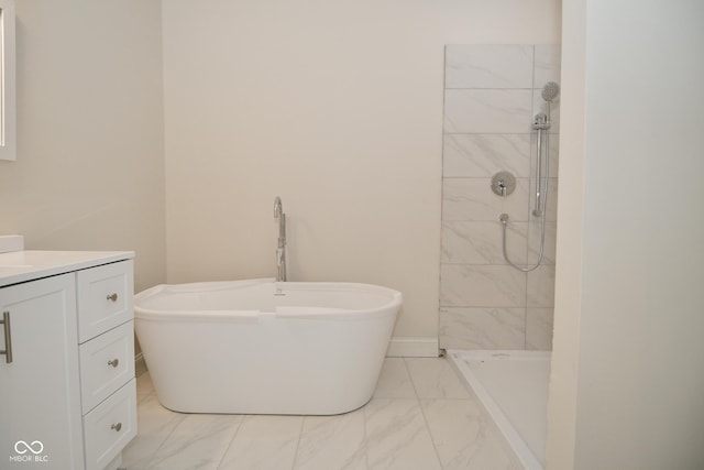 547 Udell St, Indianapolis, IN 46208 - full bath with marble finish flooring, a freestanding bath, a tile shower, and vanity