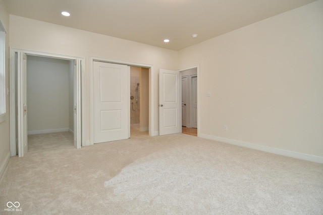 547 Udell St, Indianapolis, IN 46208 - unfurnished bedroom with light colored carpet, recessed lighting, and baseboards