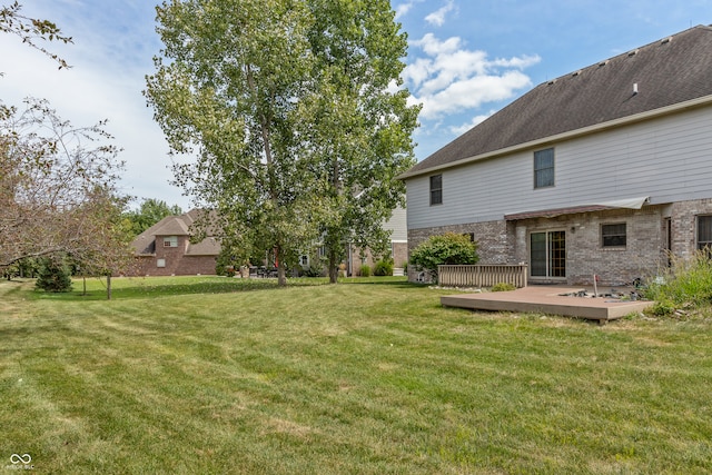 view of yard featuring a deck