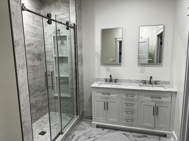 bathroom with an enclosed shower and vanity