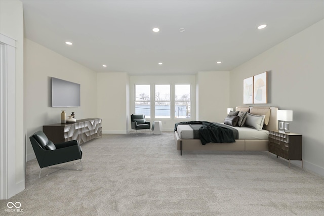 bedroom featuring light colored carpet