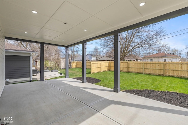 view of patio / terrace with a fenced backyard and a residential view