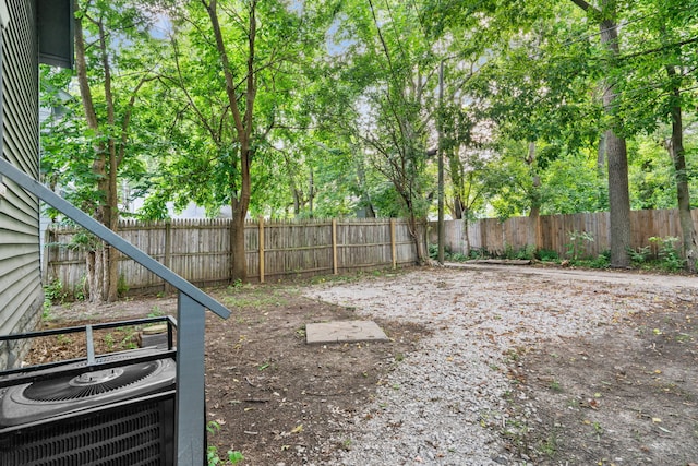 view of yard with central AC