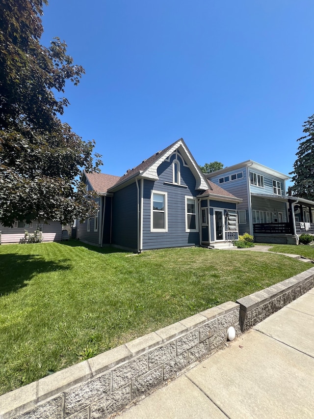 view of front of home with a front yard