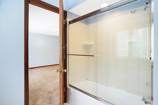 bathroom with enclosed tub / shower combo