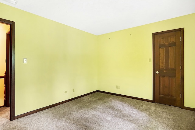 empty room featuring light colored carpet