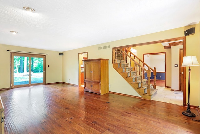 spare room featuring light hardwood / wood-style floors