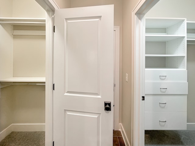 interior space featuring dark tile floors