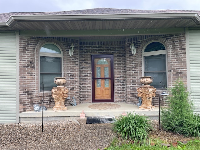 property entrance with a porch