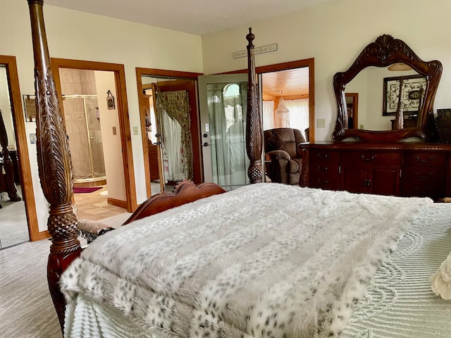 bedroom with light carpet, connected bathroom, and a closet