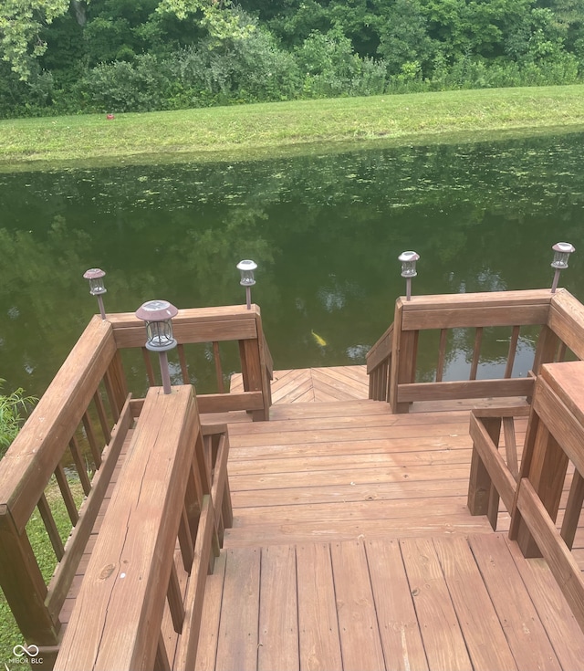 view of dock with a water view