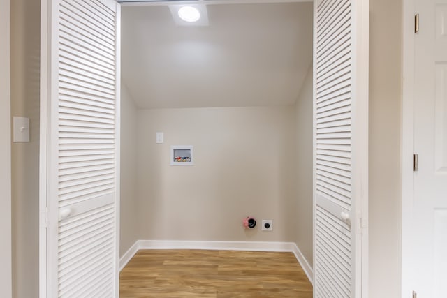 laundry area with electric dryer hookup, wood-type flooring, and hookup for a washing machine