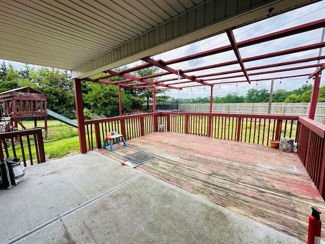 wooden deck featuring a pergola