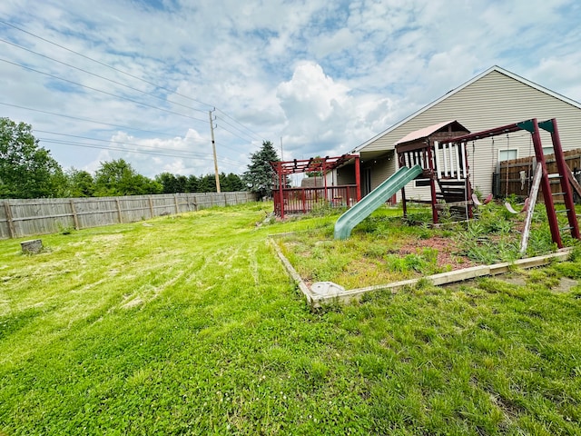 view of yard featuring a playground