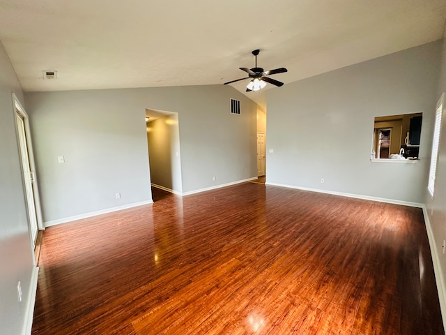 unfurnished room featuring ceiling fan, hardwood / wood-style floors, and lofted ceiling