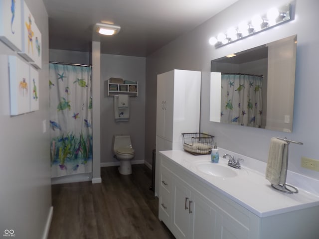 bathroom with vanity, toilet, a shower with curtain, and wood-type flooring