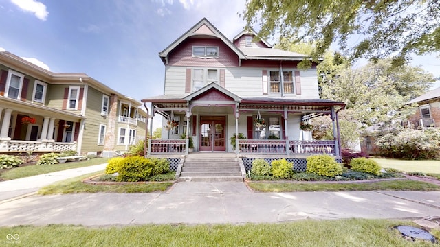 victorian-style house with covered porch